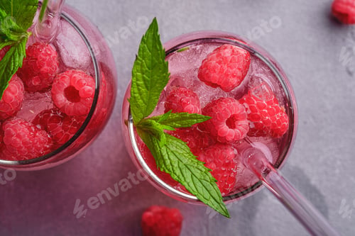 Preview: Fresh ice cold berry juice drink with mint, summer raspberry lemonade