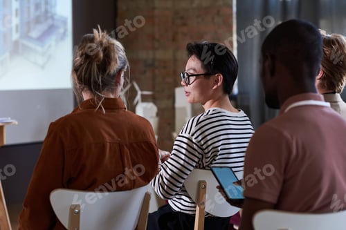 Preview: Group of people sitting at seminar