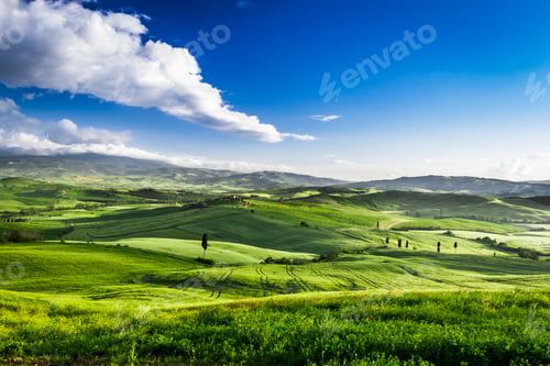 Preview: Beautiful view of the sunset over the green valley