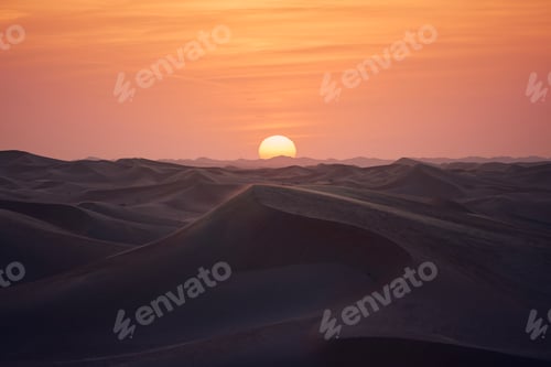 Preview: Sand dunes in desert landscape at beautiful sunset