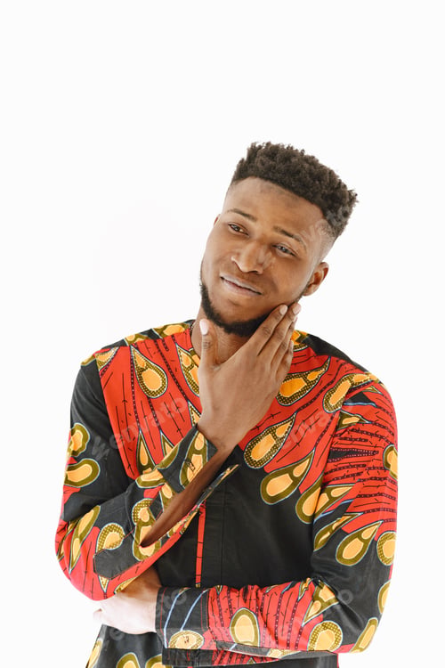 Preview: African young man posing against white wall