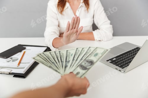 Preview: Close up portrait of hand holding cash