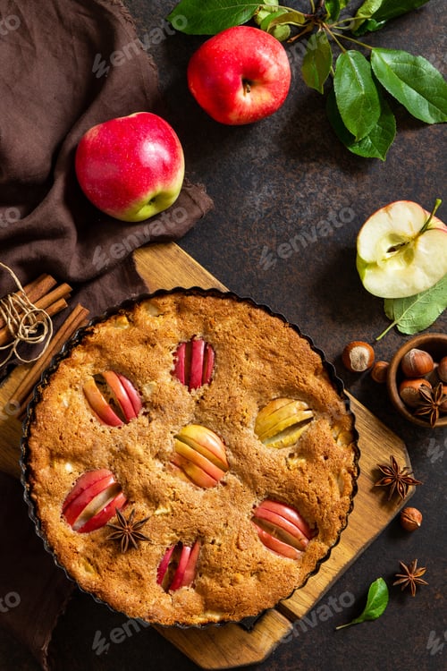 Preview: Apple pie with hazelnut and cinnamon on a stone table. Apple baking seasonal.