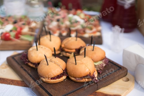 Preview: Catering banquet table at the reception. Restaurant presentation, European cuisine, food consumption
