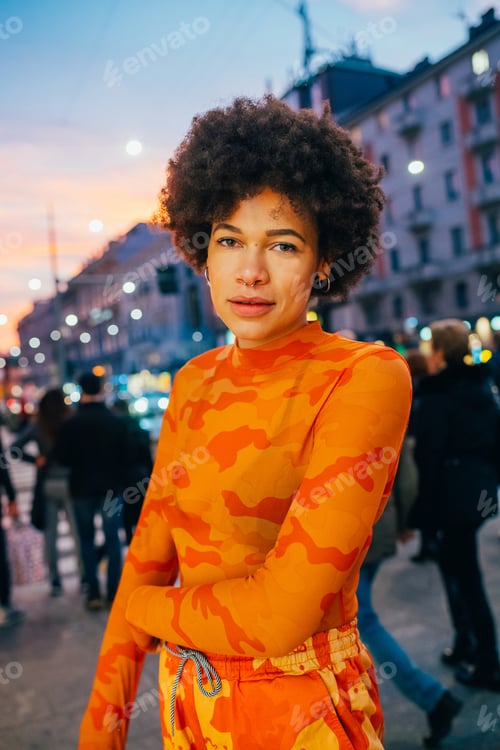 Preview: Fashionable young woman outdoor city living posing stylish and confident