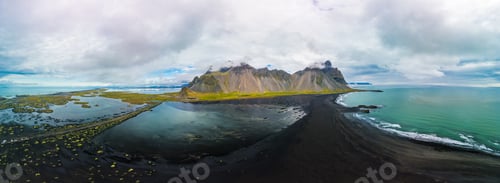 Preview: Vestrahorn mountain with black sand beach and Viking village, Iceland.