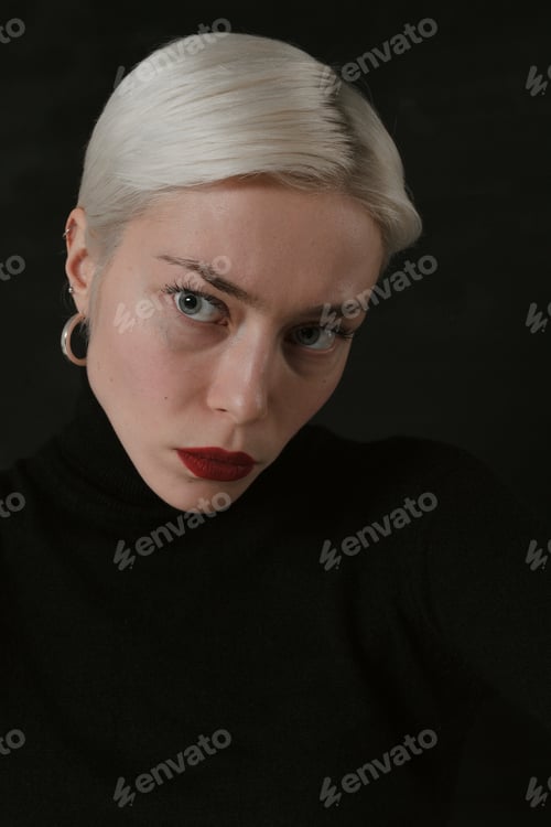 Preview: Beautiful Emotional Girl With White Hair On A Black Background