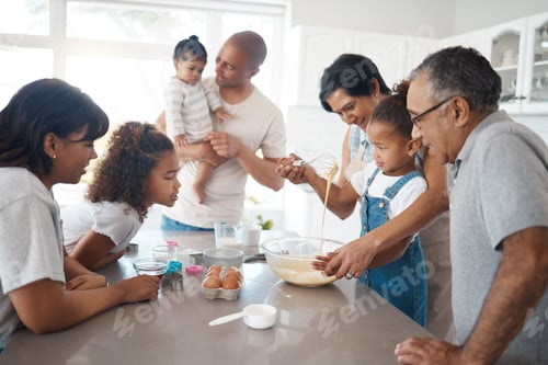 Preview: Slow Sundays are for baking with the family. Shot of a family baking together.