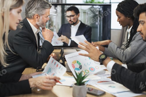 Preview: Diverse group of multiracial business people in the conference room with big TV screen