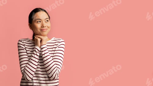 Preview: Great Offer. Happy Korean Lady Looking Aside At Copy Space With Amazement