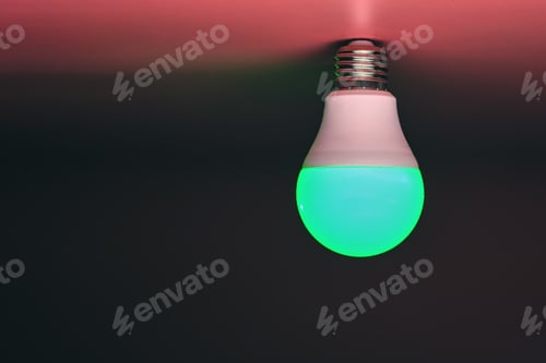 Preview: Green light bulb, modern energy saving, copy space. Minimal idea concept.