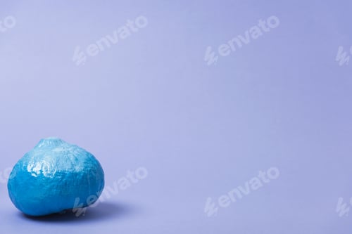 Preview: painted blue pumpkin on violet background
