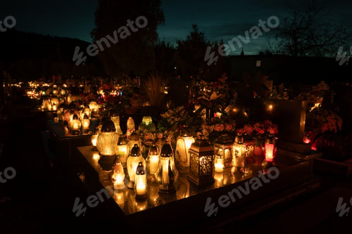 Preview: Candles on graves during All Saints' Day in Poland