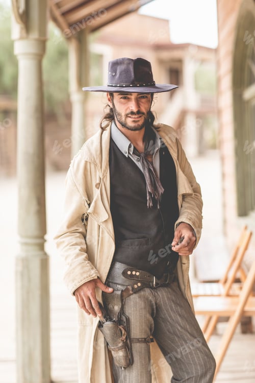 Preview: Portrait of cowboy on porch on wild west film set, Fort Bravo, Tabernas, Almeria, Spain