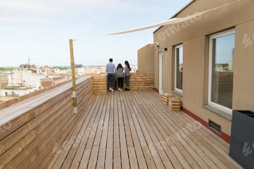 Preview: Back view of three people posing