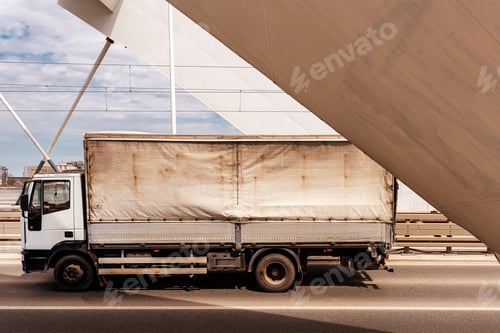 Preview: Transportation and logistics, old truck crossing the bridge