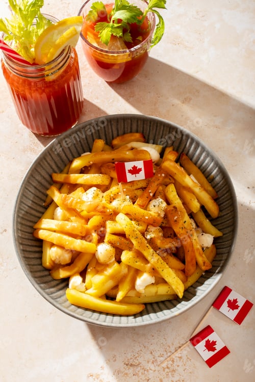 Preview: Traditional Canadian poutine with fries, cheese curds, and gravy, decorated with Canadian flag.
