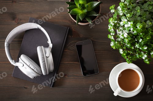 Preview: audiobook concept modern wireless headphones smartphone book