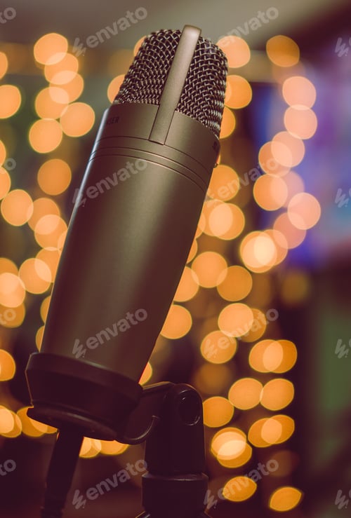 Preview: Condenser microphone with blurred lights in the background
