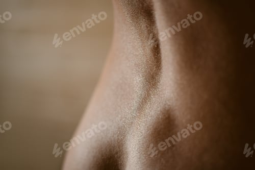 Preview: Closeup photo of bare female lower back