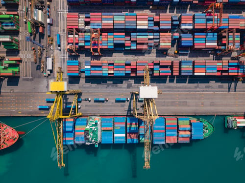 Preview: Aerial view of busy container terminal and cargo cranes
