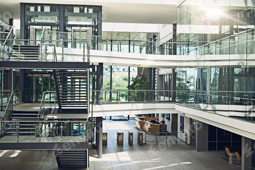 Preview: Shot of an empty three story building from the inside covered in glass windows