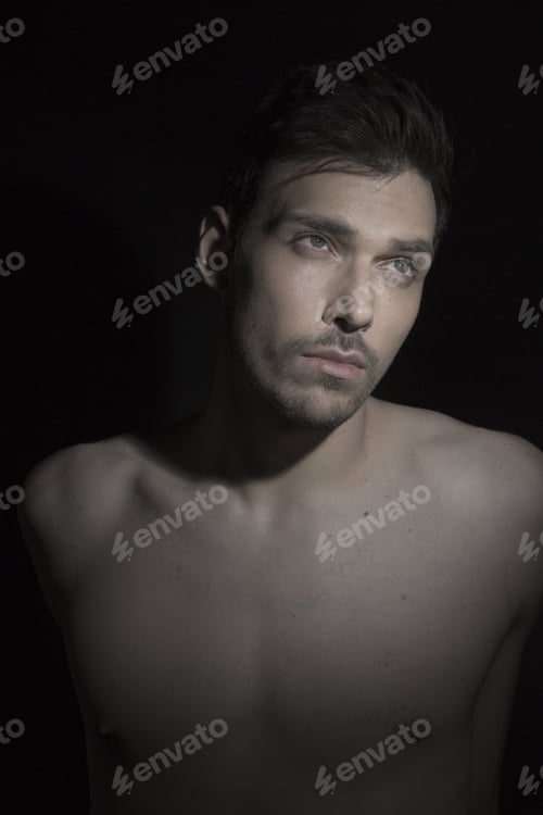 Preview: Beauty Portrait Of Young Man Looking Away To Right