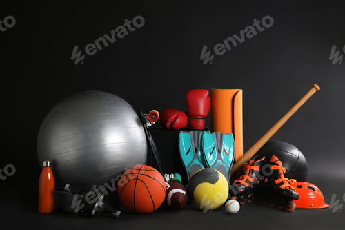 Preview: Set of different sports equipment on black background