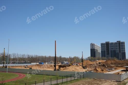 Preview: Driving and forming the pile foundation. Pile driven into ground by vibrating hydraulic hammer.