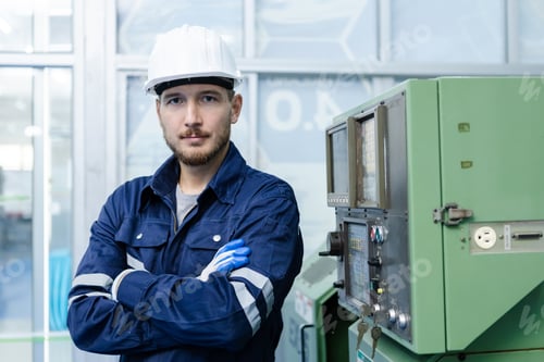 Preview: Portrait of happy smiling male engineer workers standing crossed arms
