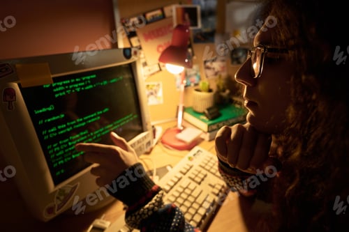 Preview: Young Programmer Working in Cozy Home Office Environment