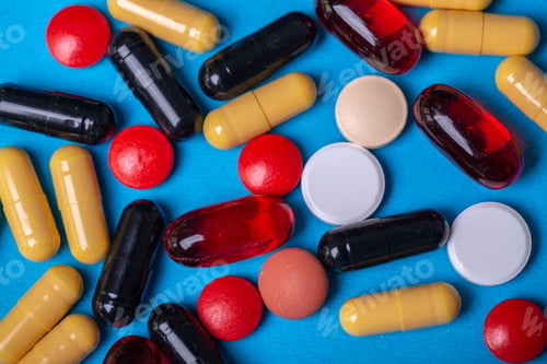 Preview: Top view with pills of many colors and shapes