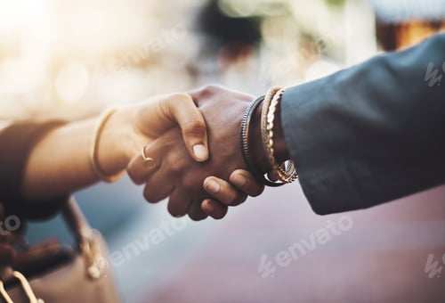 Preview: Theyve settled on something. Closeup shot of two businesswomen shaking hands in the city.