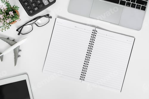 Preview: White office desk. table with blank notebook, tablet, calculator, computer and other office supplies