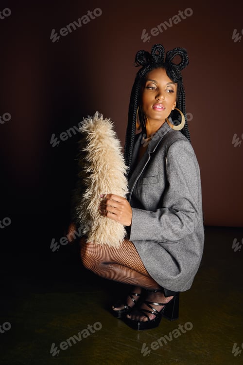 Preview: A young woman poses confidently, highlighting her unique fashion sense with strong accessories.