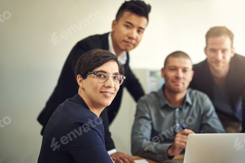 Preview: Shot of a group of coworkers having a meeting in the boardroom
