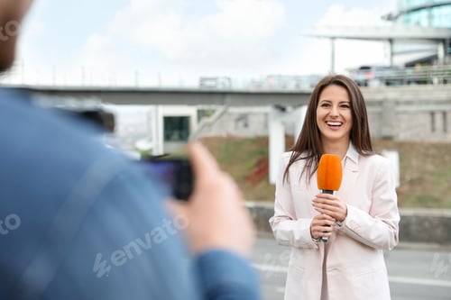 Preview: Young journalist and video operator working on city street