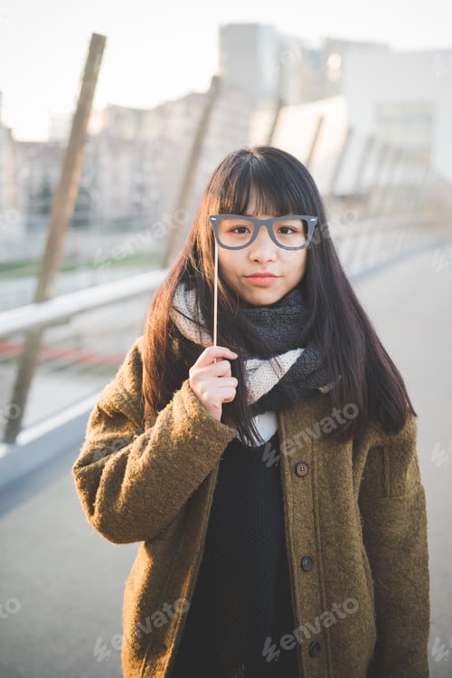 Preview: young beautiful asian hipster woman