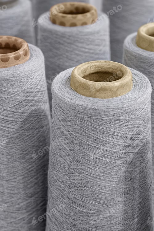 Preview: Group of large spools of thread of gray color