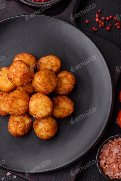 Preview: Delicious fried potato balls or croquettes with salt, spices and herbs