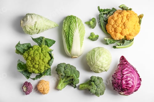 Preview: Different fresh cabbages on white background, top view. Healthy food