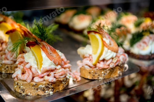 Preview: selective focus of sandwiches with shrimps, cream and lemon slices