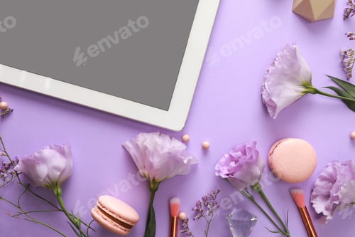 Preview: Flat lay composition with tablet on lilac background. Beauty blogger's workplace
