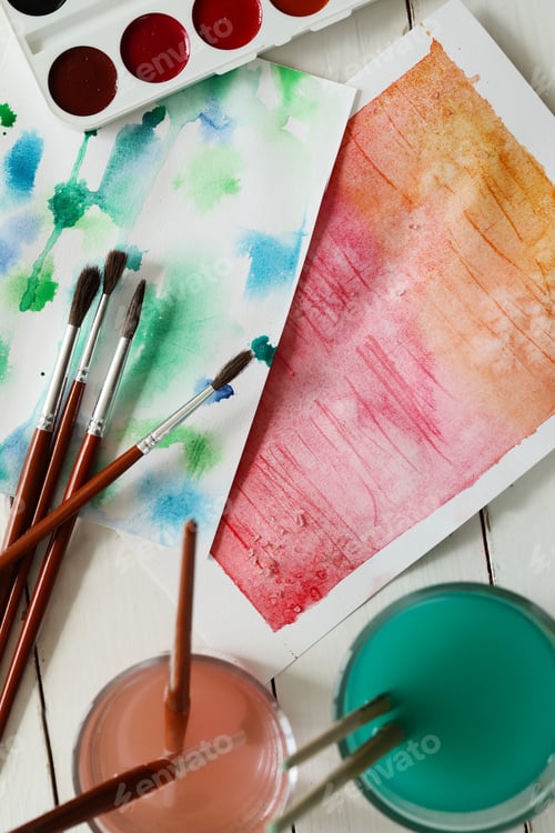 Preview: Watercolor Painting Art Supplies on White Wooden Surface