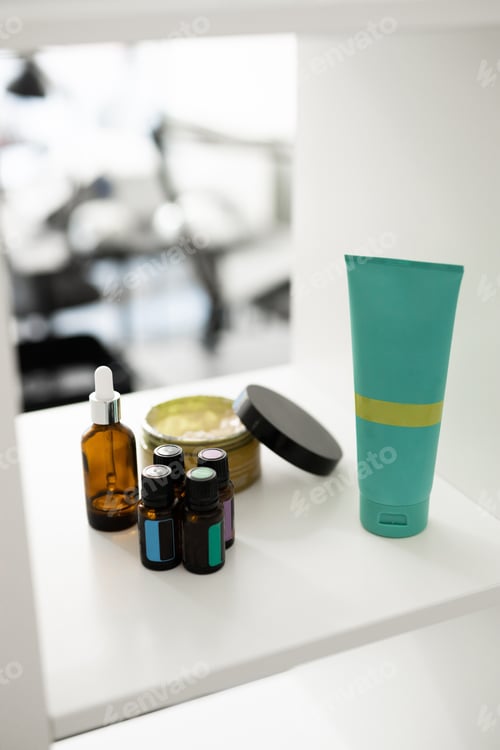 Preview: Close up of body care cosmetic products on shelf in cosmetology. Spa and piling cosmetics
