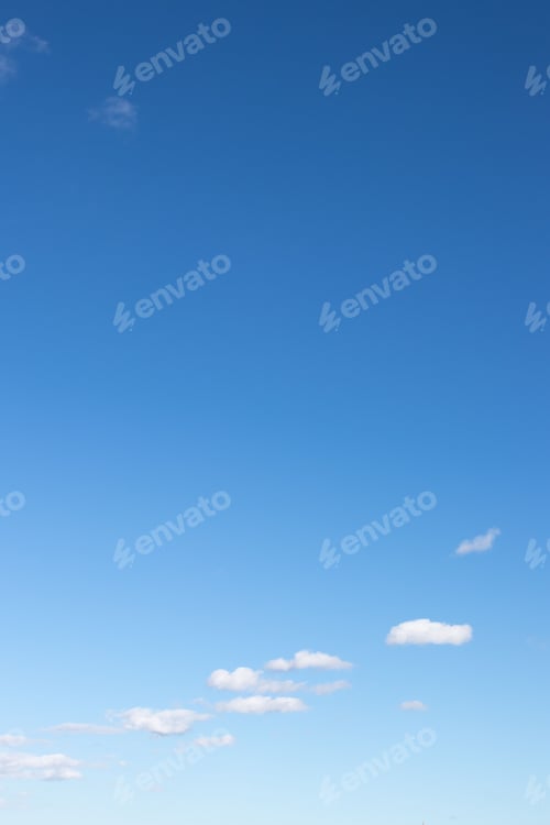 Preview: Stunning vertical view of a cloudy blue sky