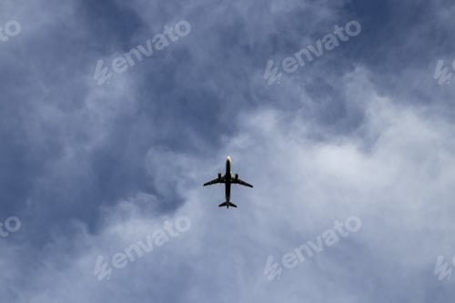 Preview: Low angle shot of an airplane during flight