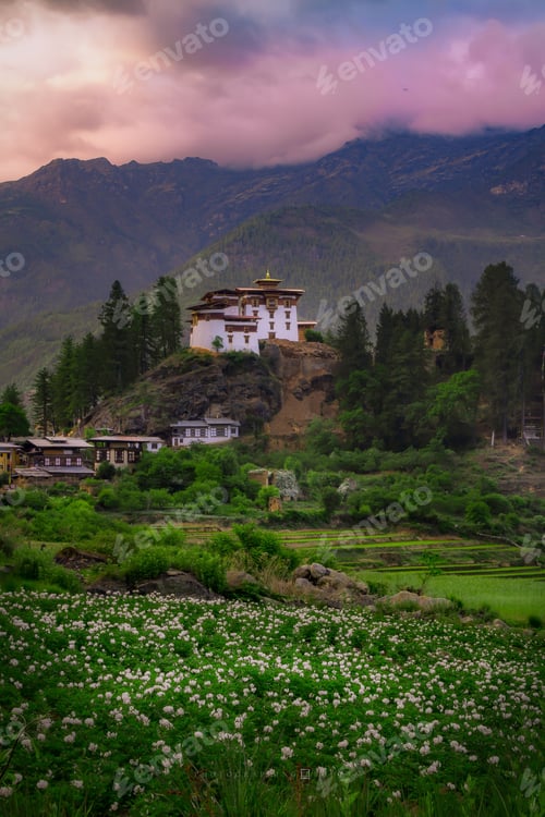 Preview: Vertical shot of Drugyel Dzong in Bhutan at sunset
