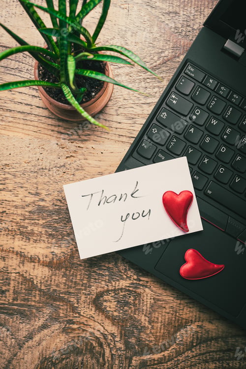Preview: Thank you concept on the sticky note paper - notebook and plant