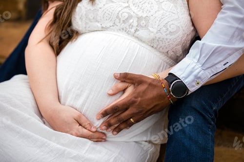 Preview: Baby bump pregnancy maternity hands details outdoors gardens Kenya